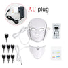 Máscara de terapia facial blanca con enchufe AU, medidor de potencia y accesorios para terapia LED.