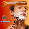 A man is shaving his face with a precision safety razor, showing a close-up of the foam and blades.