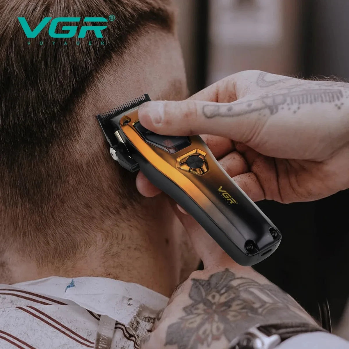A hand is using a black and gold VGR electric hair clipper trimmer on a person's head.
