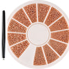 A circular plate of gold mixed stainless steel bead nail art decorations arranged in radial sections.