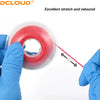 A hand is stretching a red elastic chain, demonstrating excellent stretch and rebound.