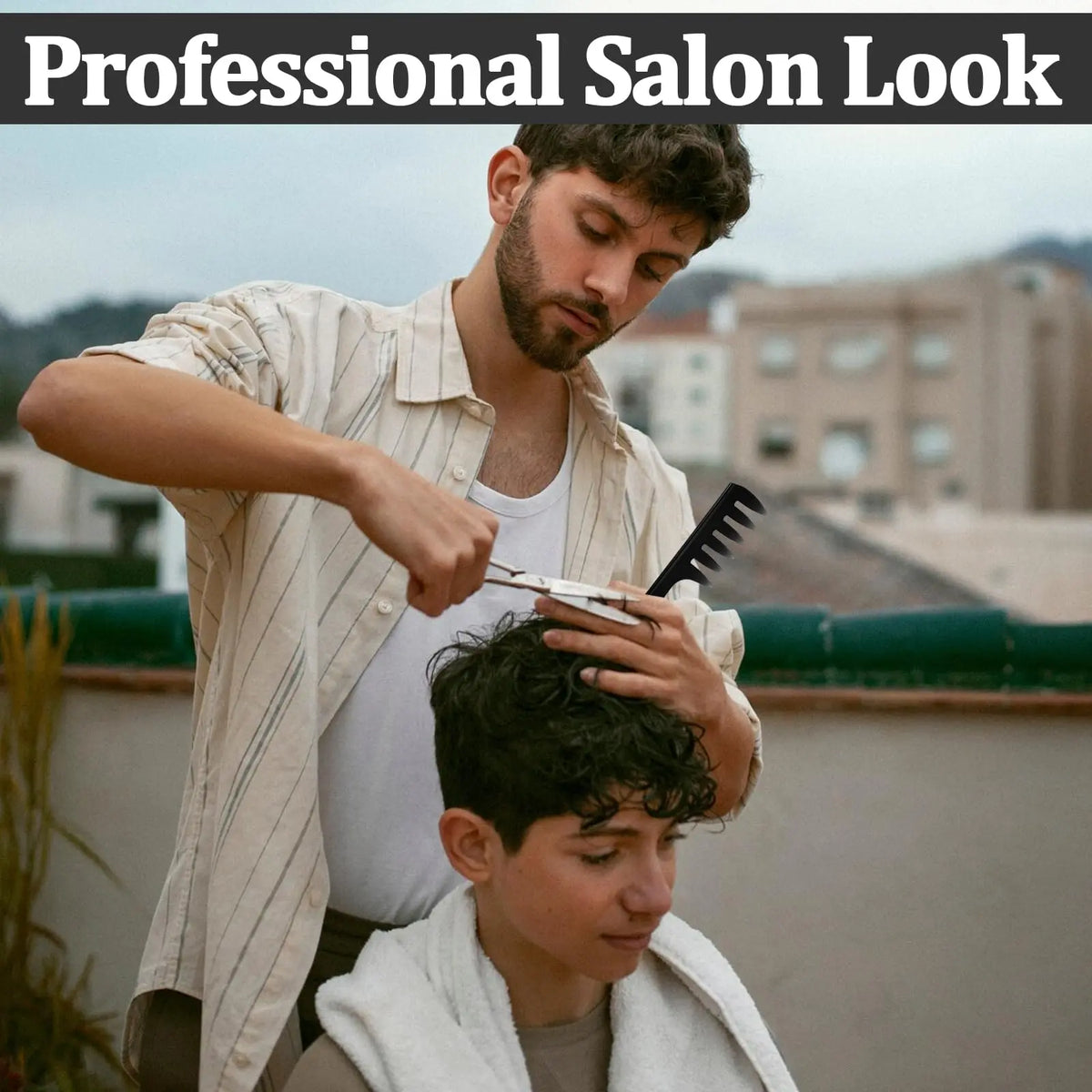 A man is using a comb to style the hair of a younger boy in an outdoor setting.