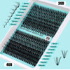 A display of individual cluster eyelash extensions in various lengths, packaged for sale.