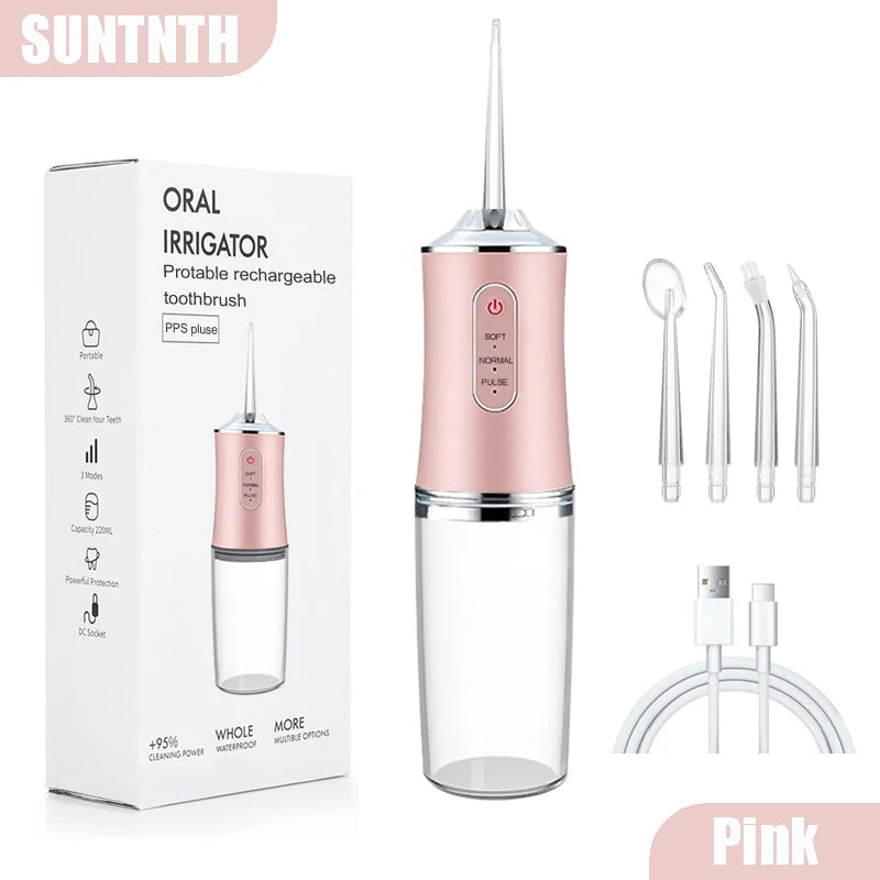 Pink portable rechargeable oral irrigator with a glass bottle and cleaning tools