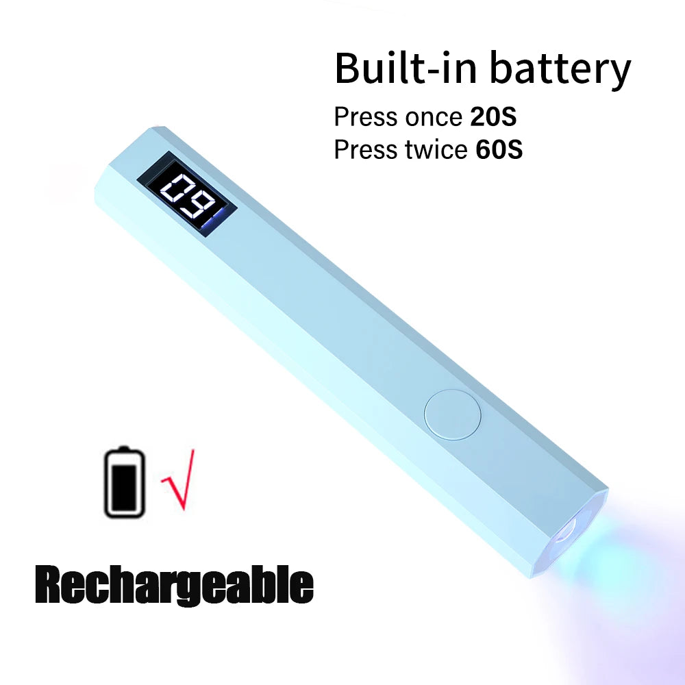 A light blue portable UV nail lamp with a digital display and rechargeable battery icon.