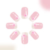 A circular arrangement of 12 press-on acrylic nails featuring a soft pink base and delicate pink flowers.