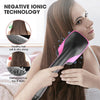 A woman is using a pink and black ceramic hot air brush hair styling tool on her long brown hair.