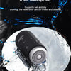 A close-up of a black electric shaver being rinsed under water, demonstrating its IPX6 waterproof feature.
