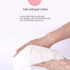 A hand is holding a white cotton wipe, demonstrating the soft and good cotton for sensitive skin.