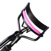 A black eyelash curler with a pink replacement pad, shown from the side.