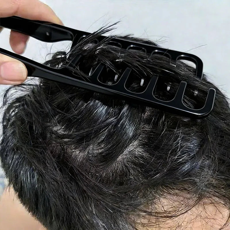 A black men's salon hair styling comb set is being held and positioned on a person's dark hair.