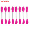 A set of eight silicone facial brushes in pink and red for exfoliation
