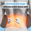 A white electric lumbar support massage pillow is shown applying vibration massage to the lower back area of a person.