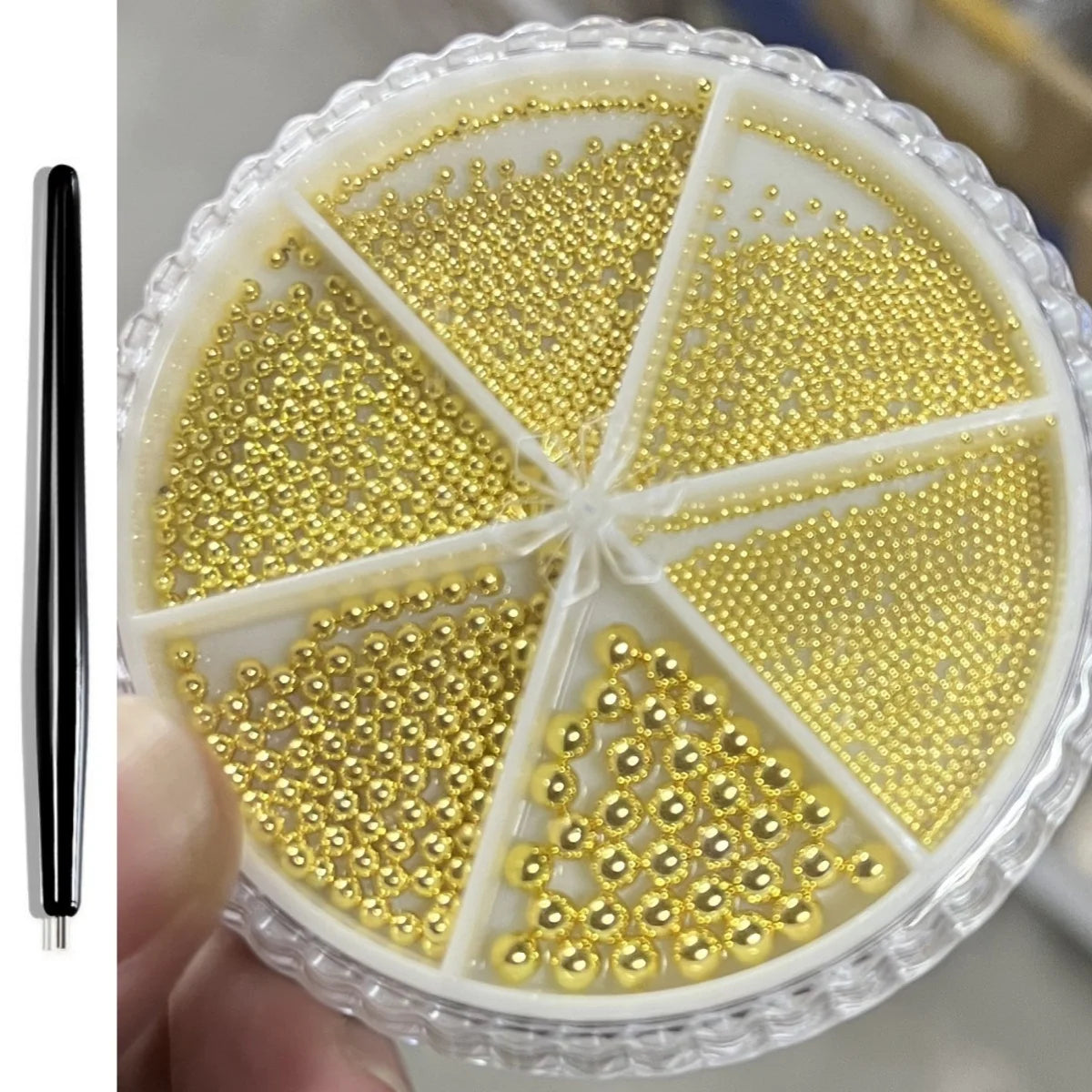 A circular nail art decoration featuring gold mixed stainless steel beads arranged in radiating triangular sections.