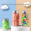 Glass jars filled with pink and green soundproof earplugs next to a white cloud graphic