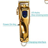 A gold-colored Kemel electric hair clipper with a display and charging interface.