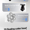 A close-up view of a silver electric shaver head with multiple rotating blades inside a charging case.