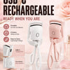 A pair of pink electric heated eyelash curlers are shown next to a white one, highlighting the USB-C rechargeable beauty tool
