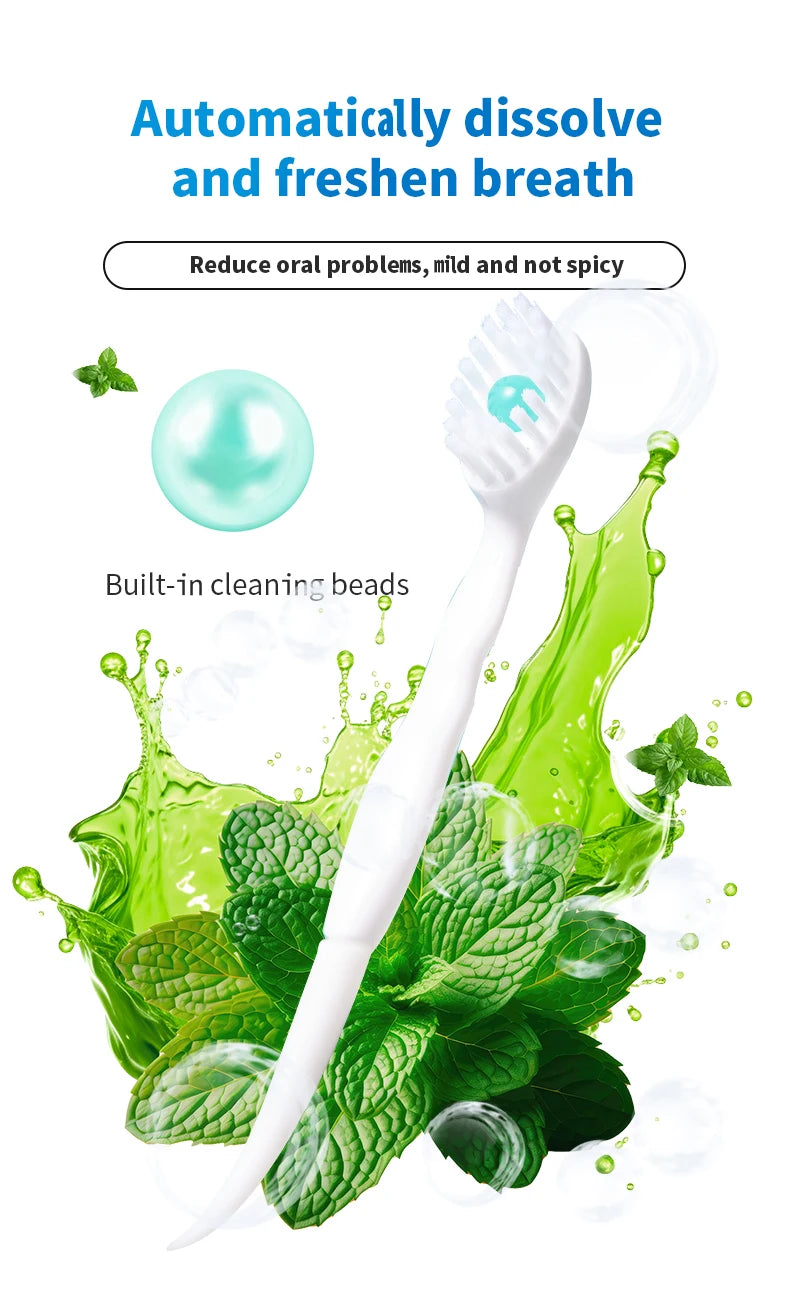 Une brosse à dents blanche avec des billes nettoyantes intégrées et des feuilles de menthe fraîche faisant disparaître la hal