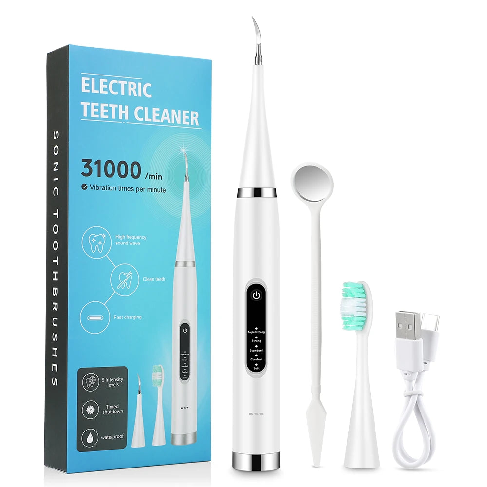 A white electric teeth cleaner device with a cleaning tip, a spoon, and charging cable shown next to its packaging.