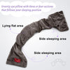 A gray gravity eye pillow with three or four sections designed to follow the sleeping position.