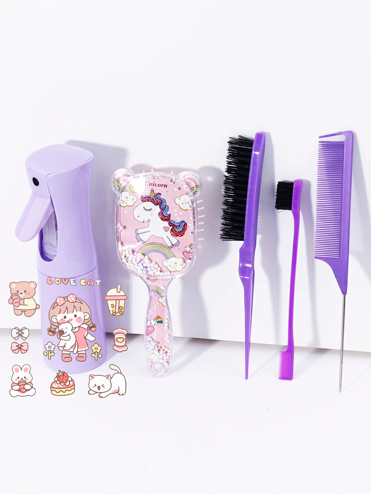 A purple hair styling kit featuring a unicorn-themed brush, comb, and styling tools.