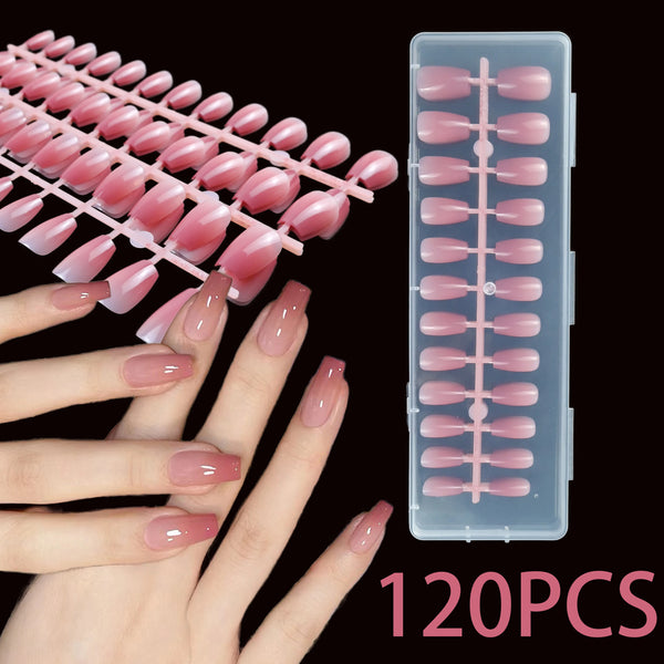 A set of 120 pink French ballet press-on nails displayed on a hand and in a clear plastic container.