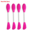 Set of four silicone facial brushes in pink and red for exfoliation