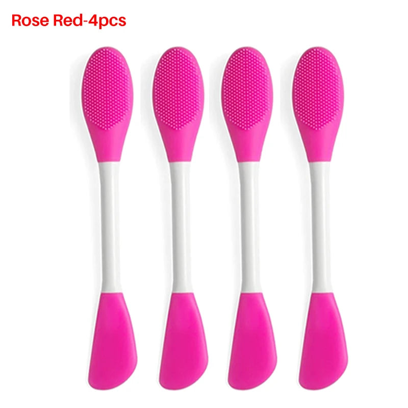 Set of four silicone facial brushes in pink and red for exfoliation