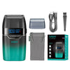 A professional electric beard trimmer shaver with a green and black body, accessories, and replacement blades.