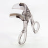 Clear plastic dual-type eyelash curler with a comb attachment.