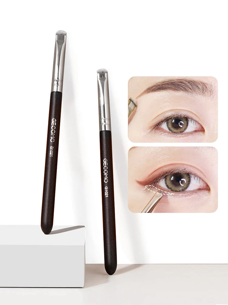 A set of black precision makeup brushes for eyes and brows, shown vertically against a white background.