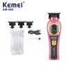 A pink Kemei KM-999 cordless electric hair clipper with a black charging cable and multiple hair cutting attachments.