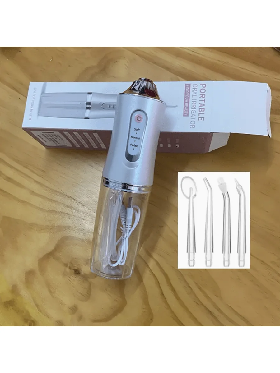 A portable electric oral irrigator device in silver and black packaging with included tips.
