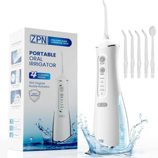 A white portable oral irrigator device is shown next to its packaging box, with water splashing around it.