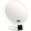 A white 30X magnifying foldable handheld vanity mirror with a black grip.