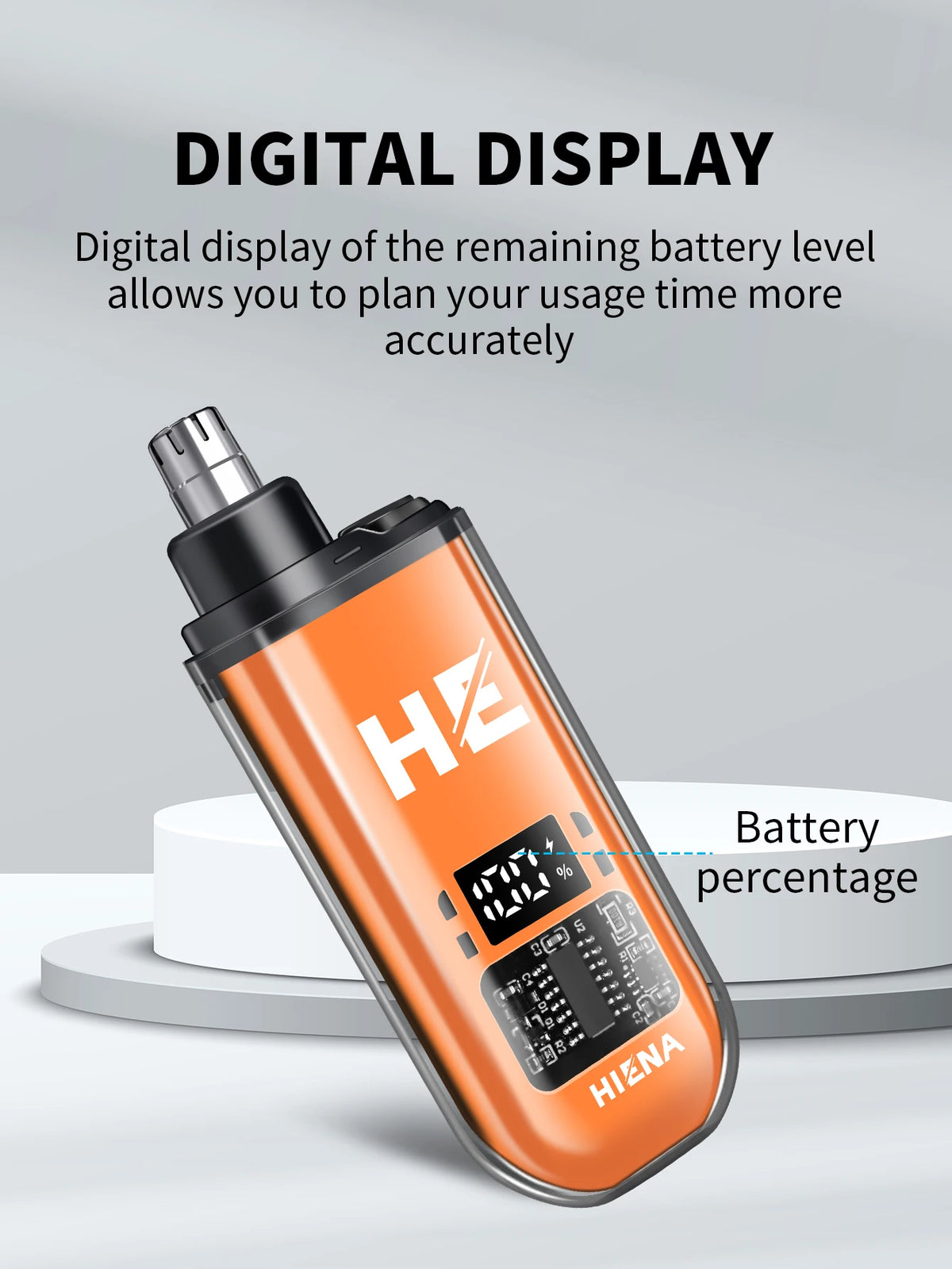 Orange and black electric hair clipper with a digital display showing battery percentage.