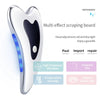 A silver multi effect scraping board with blue and red lights for facial massage and skin treatment.