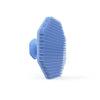 A light blue silicone facial cleaning brush with dense bristles shown against a white background.