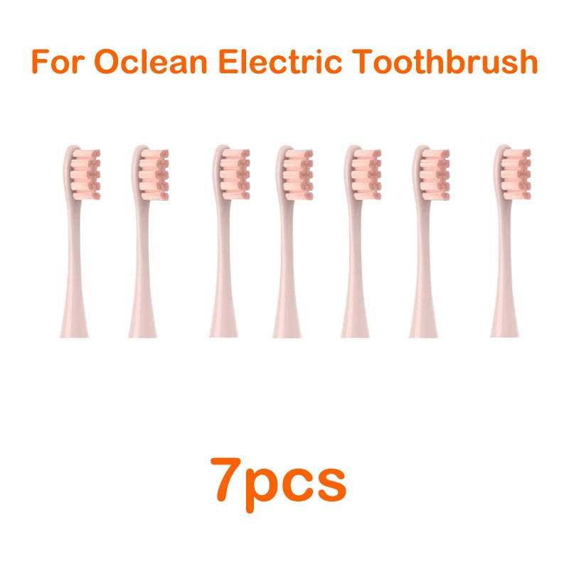 Seven replacement pink bristles for an Ocean electric toothbrush.