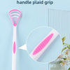 A pink and white silicone tongue scraper with a textured non-slip braid grip shown against a light blue background.