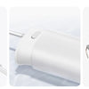 A white portable cordless oral irrigator device shown in three views: a close-up of the main unit, a side view, and packaged 