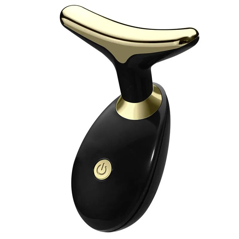 A black and gold electric facial lifting and firming massager device.