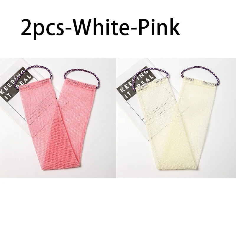 Two white-pink exfoliating body scrub sponges with purple loops shown against a white background.