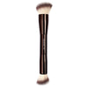 A brown double-ended makeup brush set with a fluffy brush and a flat brush.
