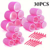 A set of 30 pink heatless hair styling rollers and hair curlers.