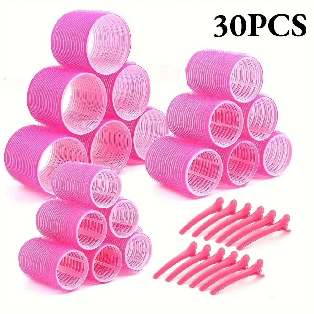 A set of 30 pink heatless hair styling rollers and hair curlers.