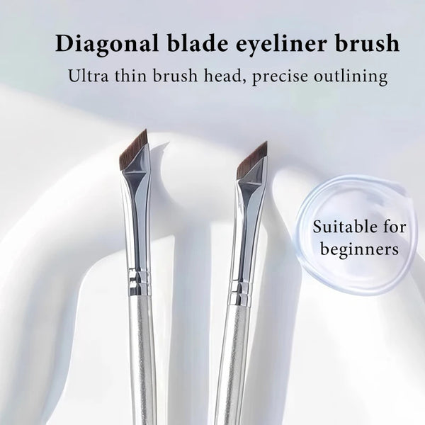 A pair of diagonal blade eyeliner brushes shown against a white background with a clear container.