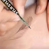 A hand is using an ultra-fine liquid eyebrow pen to draw natural-looking eyebrows on skin.