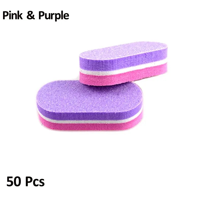 A pack of 50 pink and purple dual-grit nail buffing blocks.